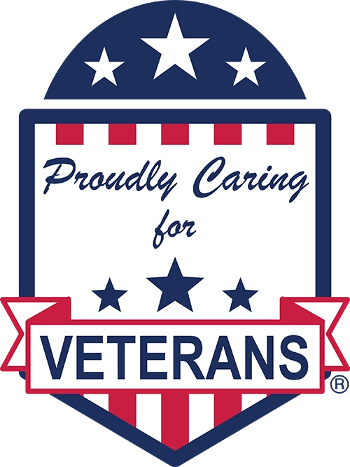 Proudly Caring For Veterans badge.