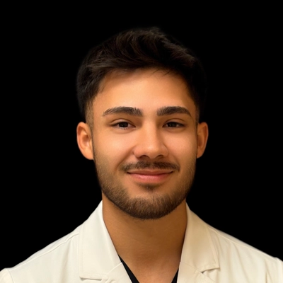 A headshot photo of Dr. Alfredo Robles, a chiropractor at Doctor Arevalo